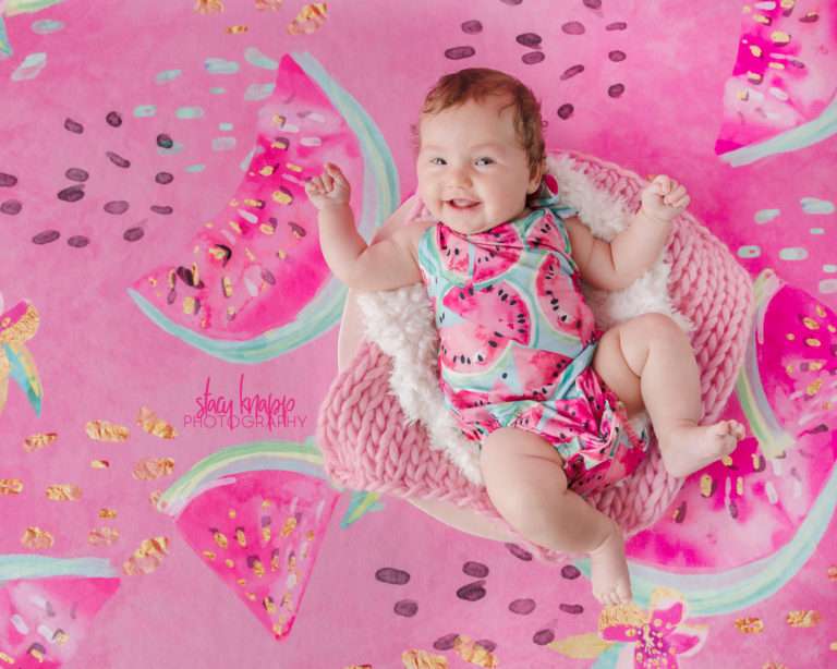 Baby girl photographed wearing watermelon outfit