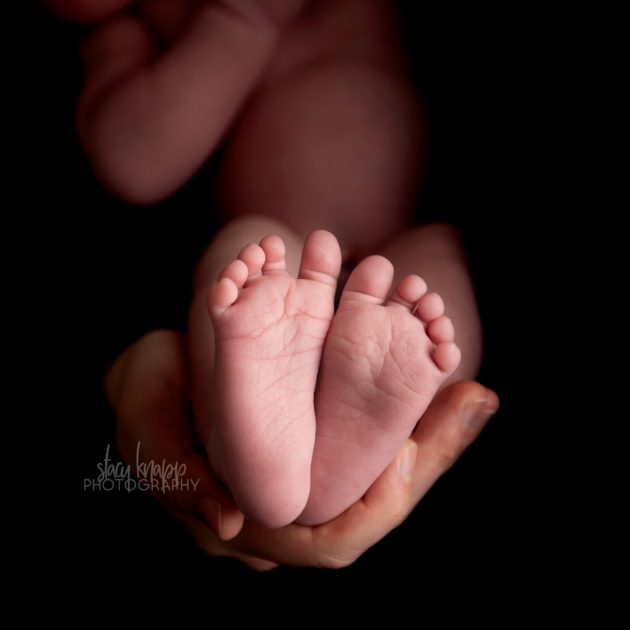 Newborn baby photograph of feet close up