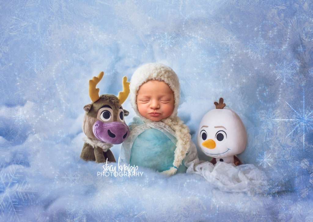 newborn baby girl photo of baby as Elsa from frozen wrapped baby