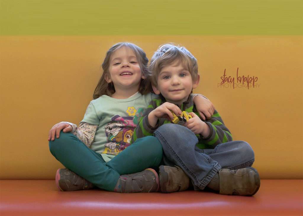 A little boy and his best friend at the library