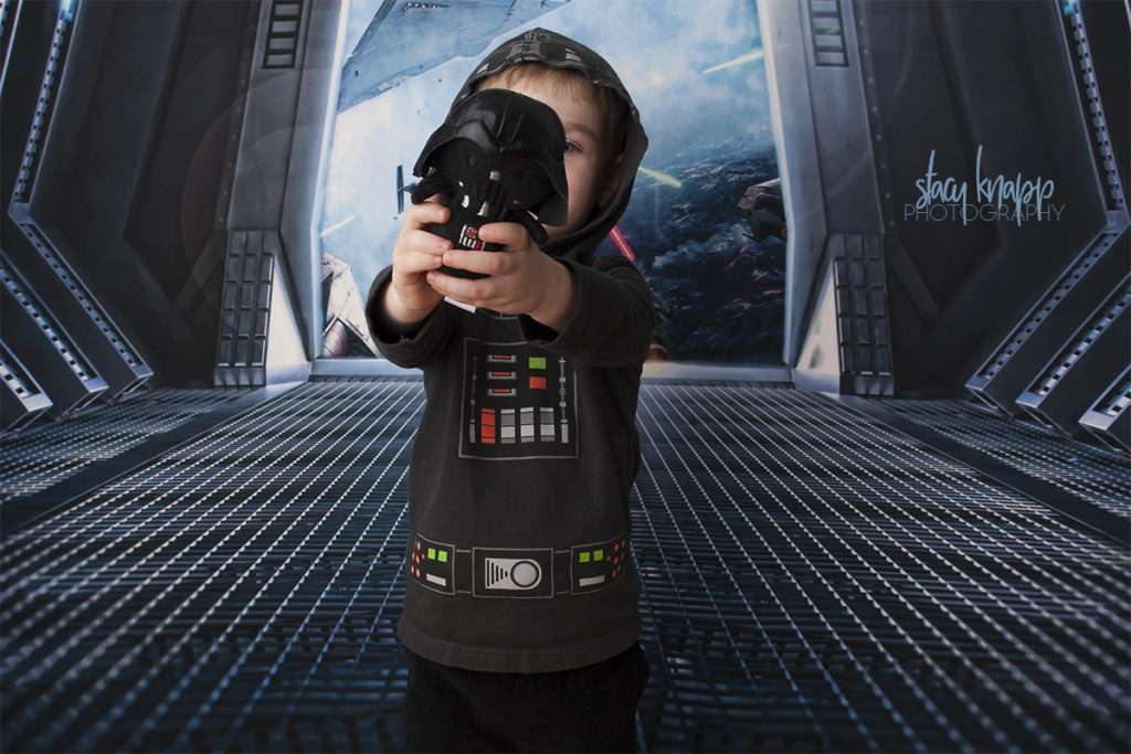 Star Wars photograph of little boy with Darth Vader