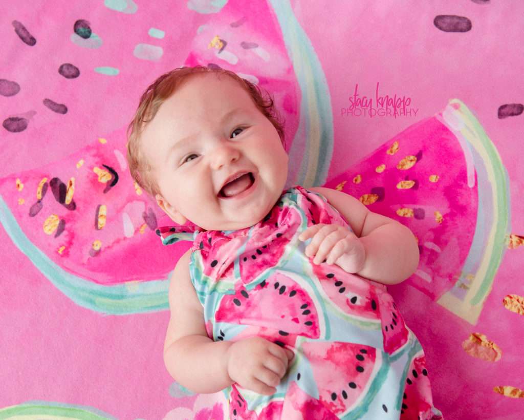 Baby girl photographed wearing watermelon outfit
