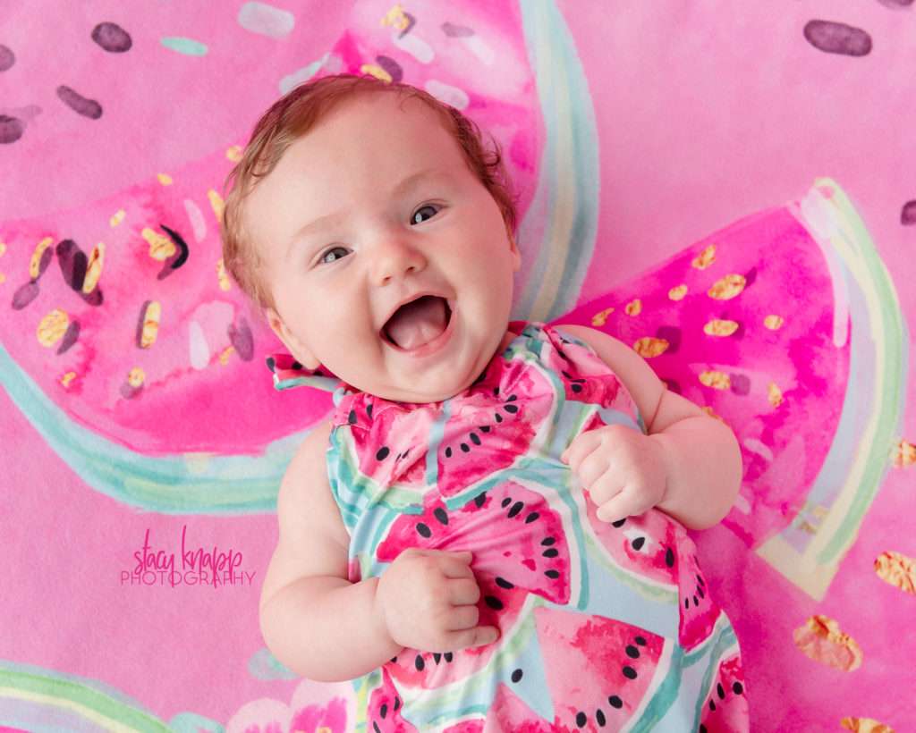 Baby girl photographed wearing watermelon outfit