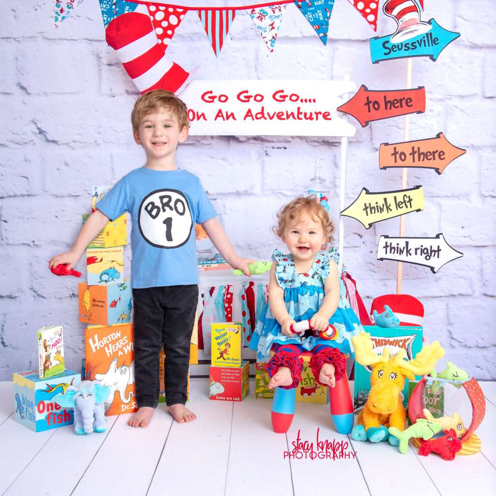 Preschool boy and baby girl photographed on Dr Seuss backdrop