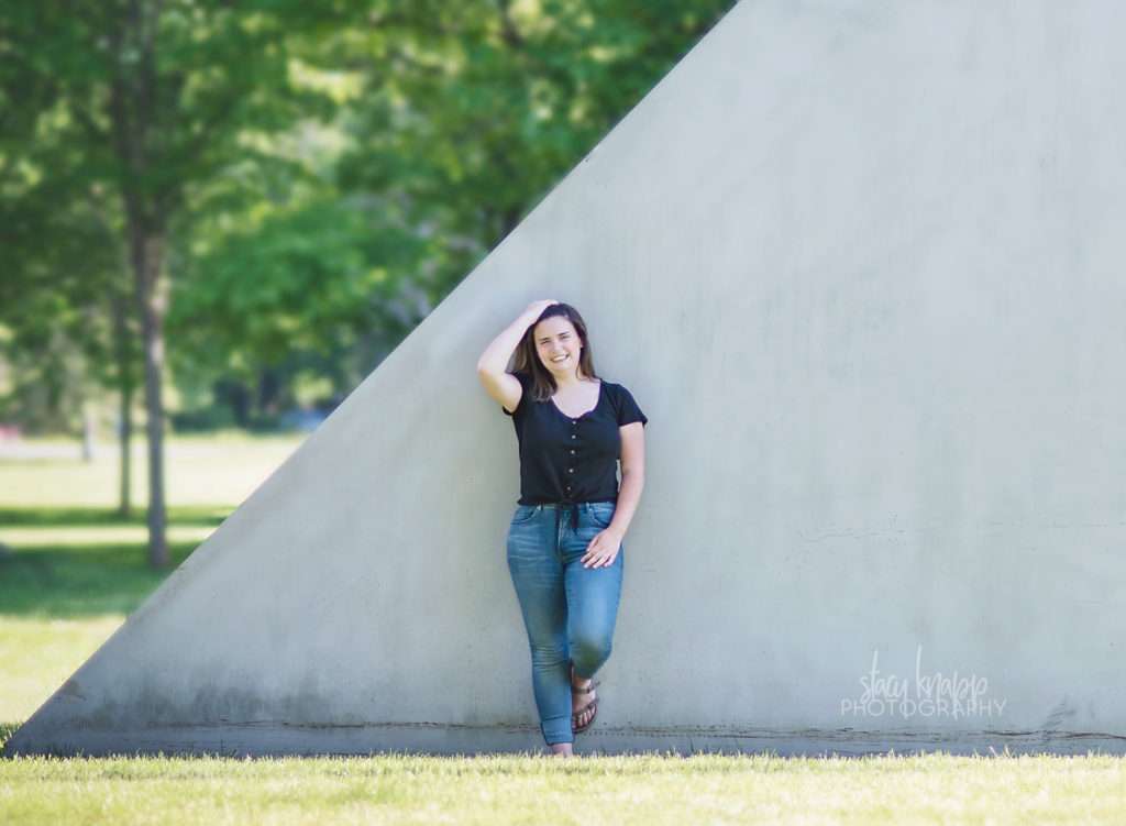 Senior girl photo on cement wall