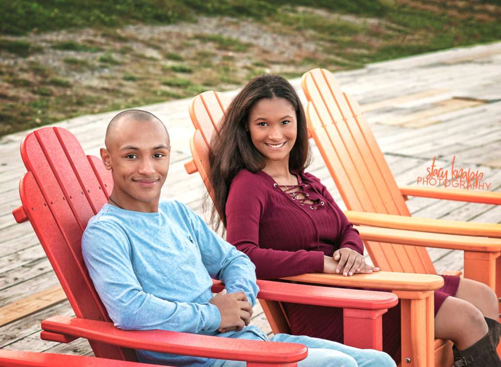 Senior twins in chairs