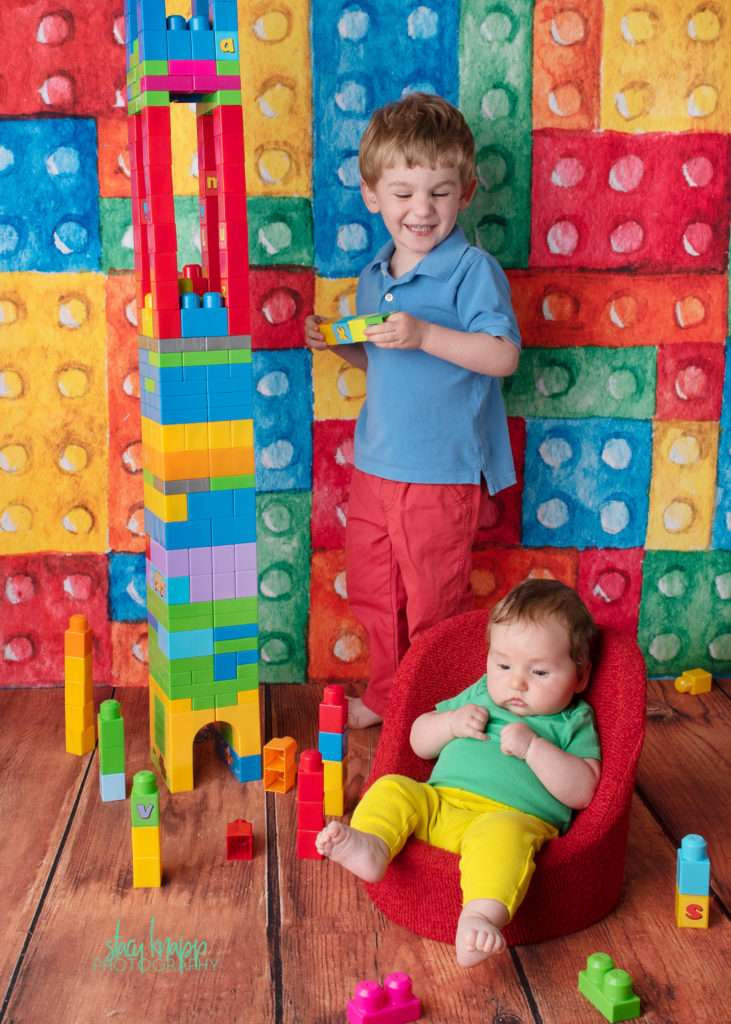 Brother and sister photo on lego backdrop