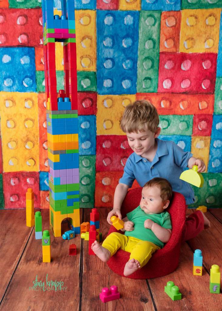 Brother and sister photo on lego backdrop