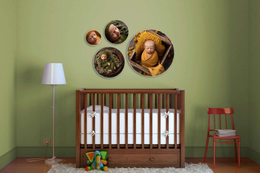 Newborn portraits of baby boy in round photoblocks on a wall