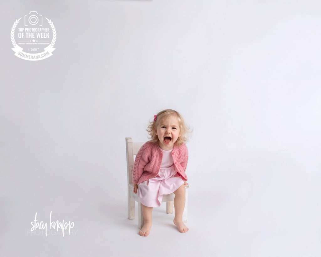 Top photographer of the week children photograph of two-year-old girl in pink with a unicorn
