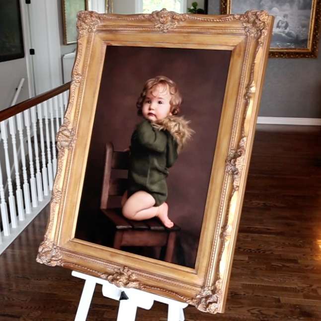 Maine baby girl in green romper on chair fine art framed canvas by photographer Stacy Knapp Photography